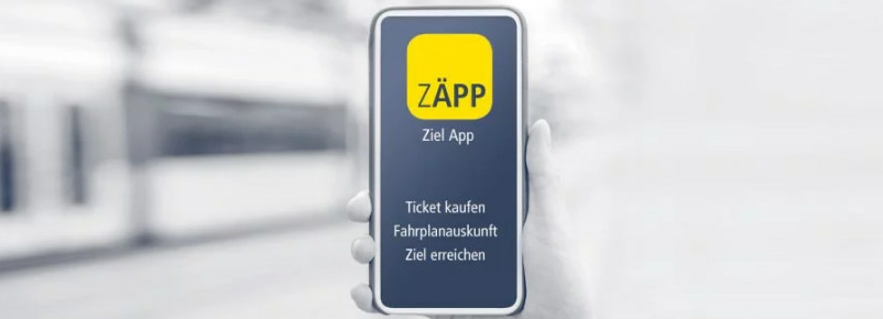 Foto: App ZÄPP auf einem Mobiltelefon zeigt an: Ziel App, Ticket kaufen, Fahrplanauskunft, Ziel erreichen